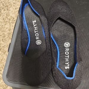 Rothy's Elegant Black Flats with Blue Trim